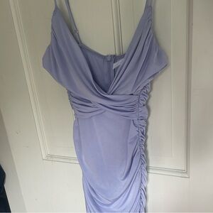 Light purple mini dress, wrap style.